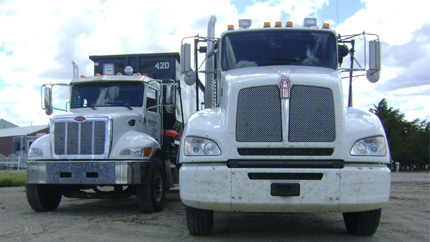 A picture of our roll-off trucks